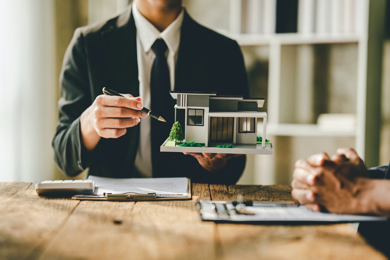 Adviser explaining a mortgage to a client